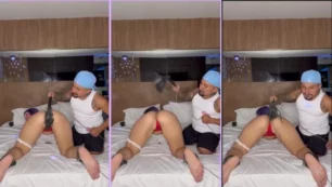 Belle Belinha recebendo umas palmadas do Anão Pistolinha na parte traseira.