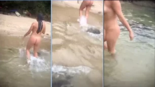 Novinha de 18 anos fazendo nudez e exibindo em público na praia