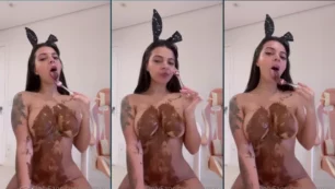 Yasmaia sensualizando ao passar chocolate nas teta avantajados