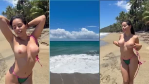 Flagra de novinha gata fazendo topless na praia!