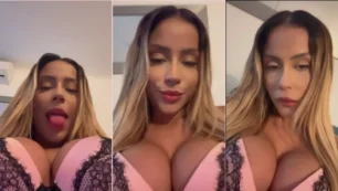 Anitta, toda ousada, mordendo os lábios e exibindo a língua